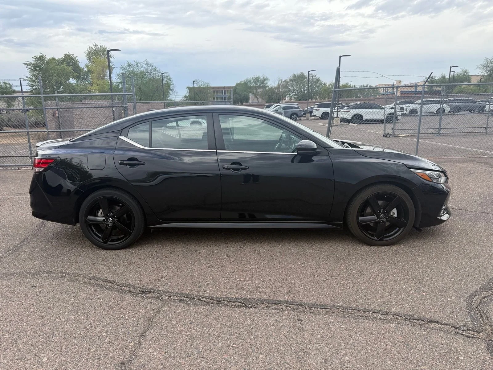 Used 2023 Super Black Nissan SR image 3