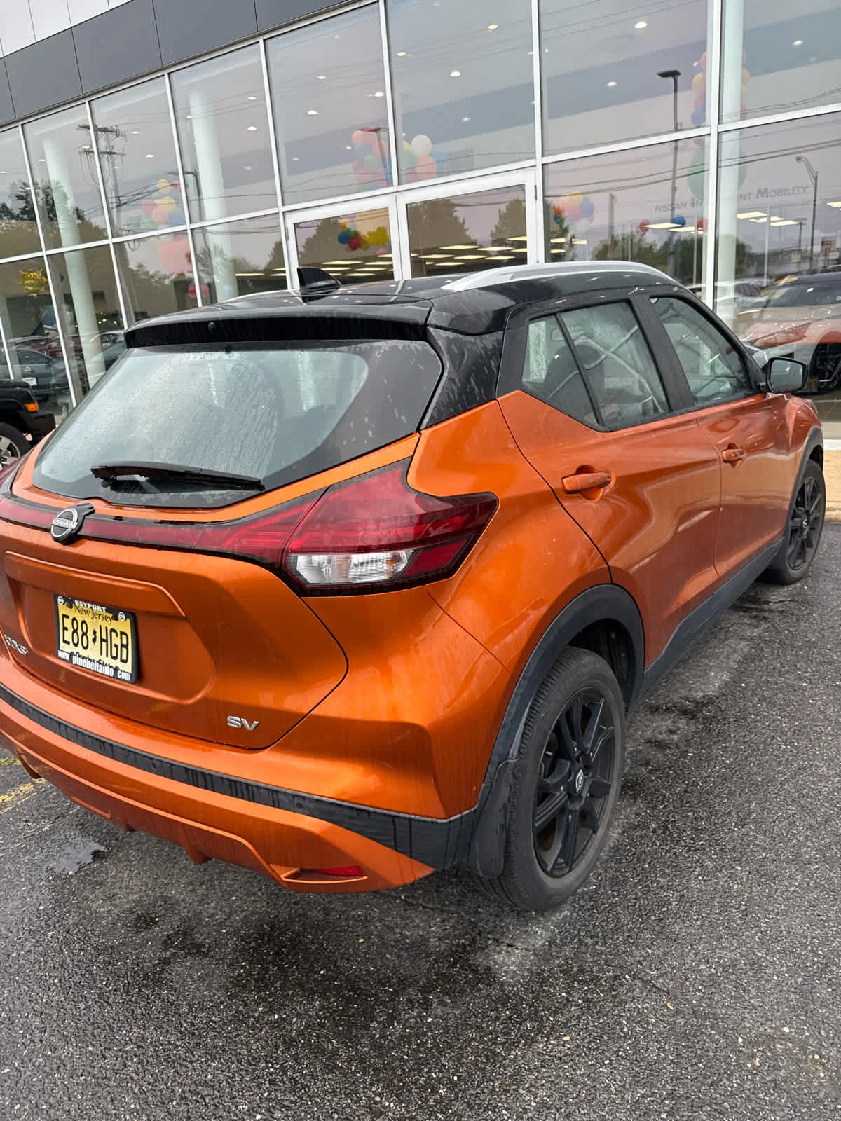Used 2022 Monarch Orange Metallic/Super Black Nissan SV image 8