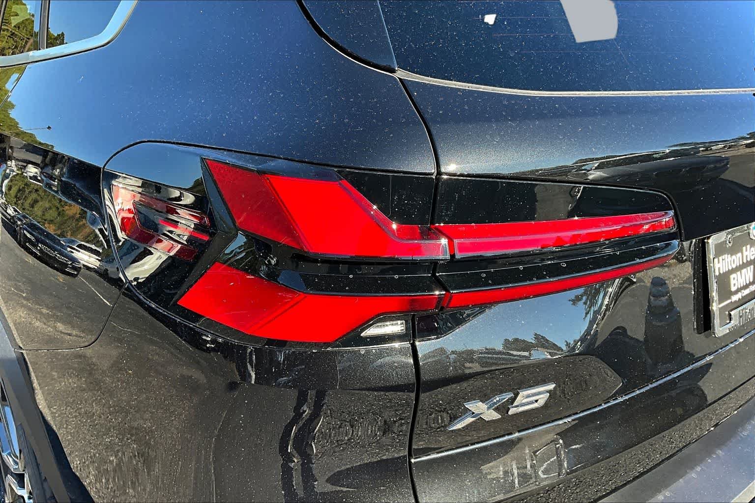 New 2026 Black Sapphire Metallic BMW xDrive50e image 14