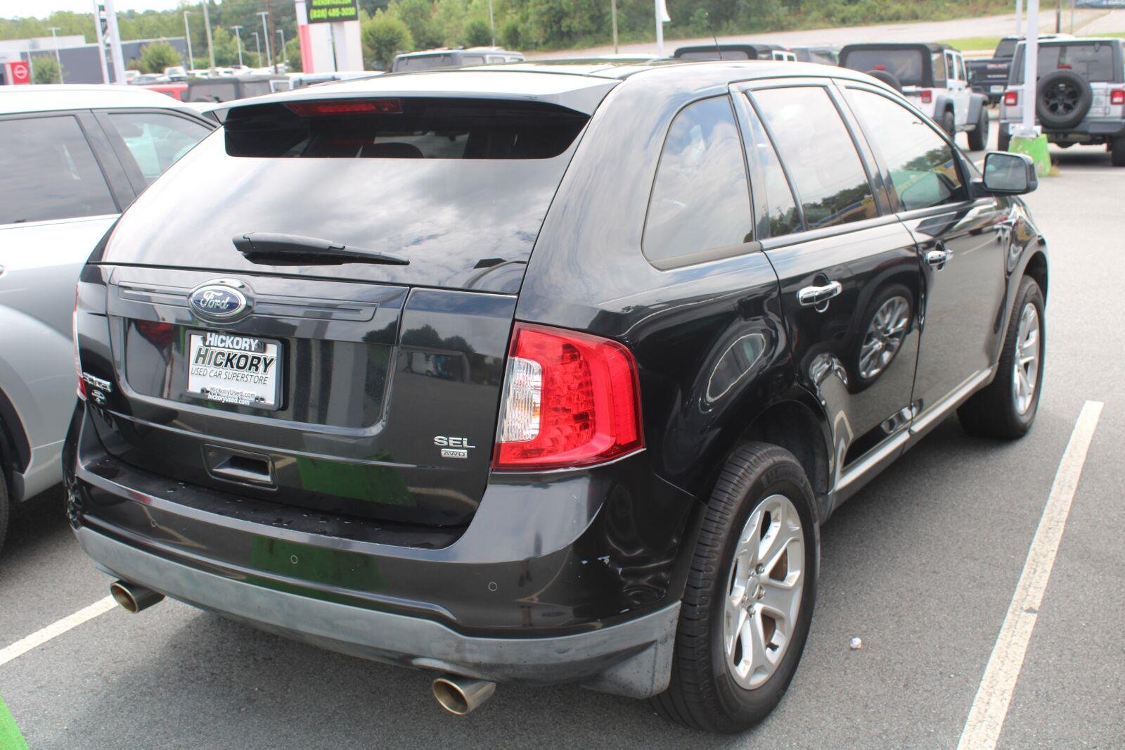 Used 2011 Tuxedo Black Metallic Ford SEL image 4