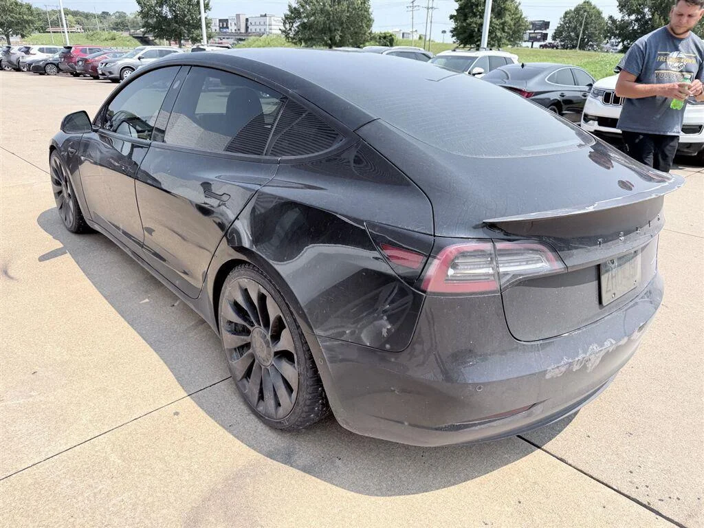 Used 2021 Solid Black Tesla Performance image 5