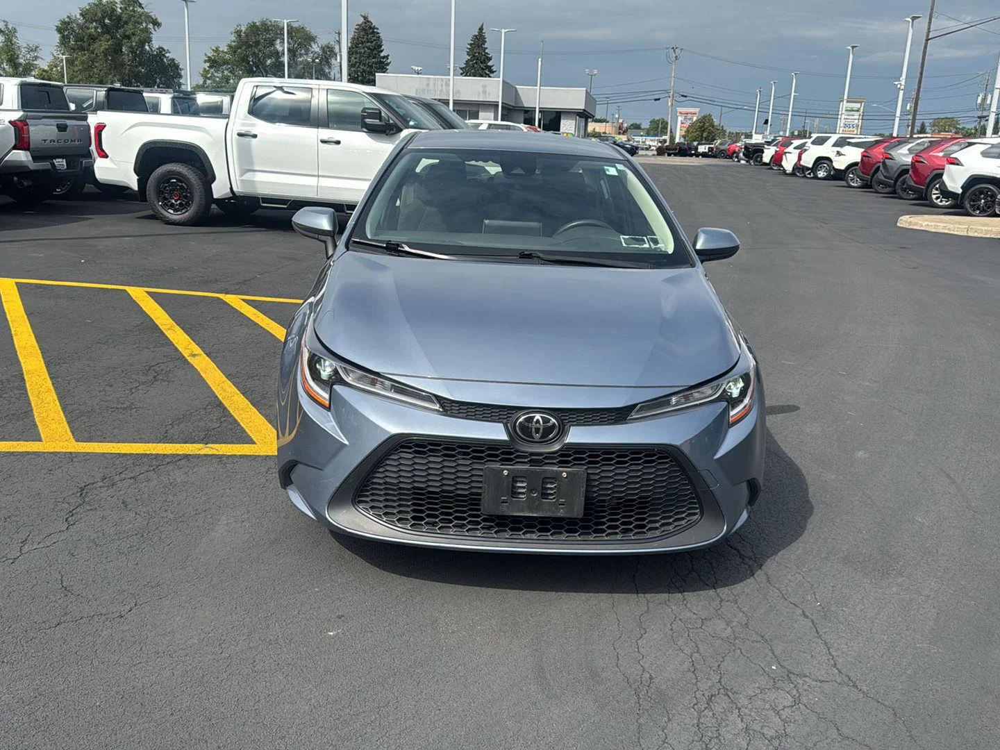 Used 2020 Celestite Gray Metallic Toyota LE image 2