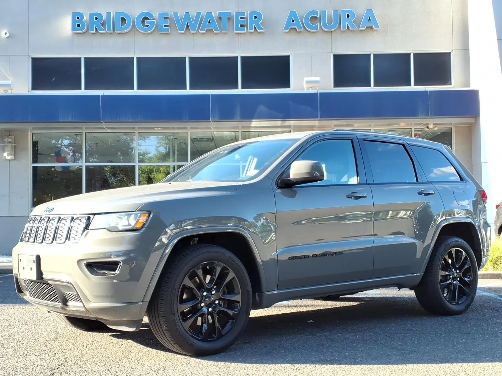 Used 2021 Granite Crystal Metallic Clear Coat Jeep Laredo X image 1