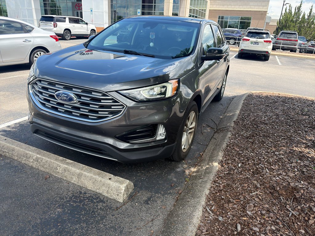 Used 2020 Magnetic Metallic Ford SEL image 1