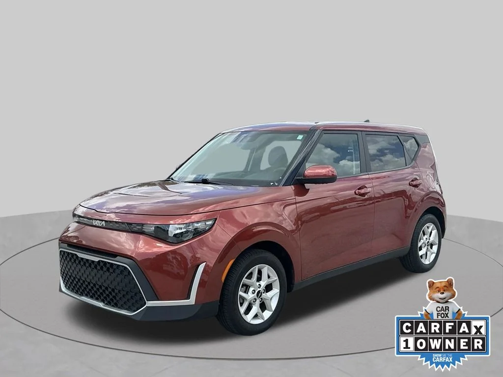 Used 2024 Orange Kia LX image 1