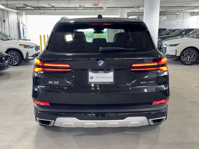 Used 2025 Black Sapphire Metallic BMW sDrive40i image 7