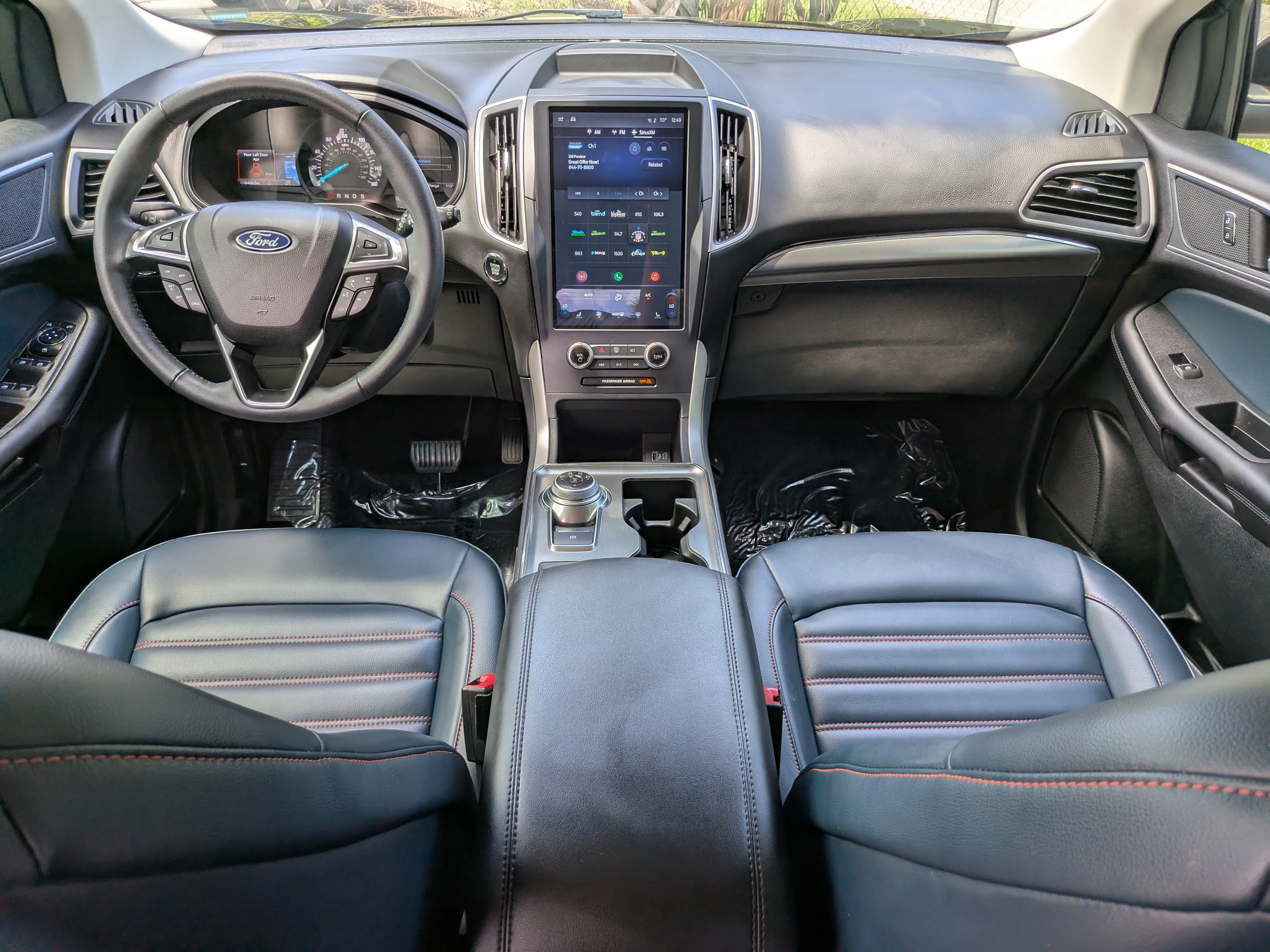 Used 2024 Agate Black Metallic Ford SEL image 19