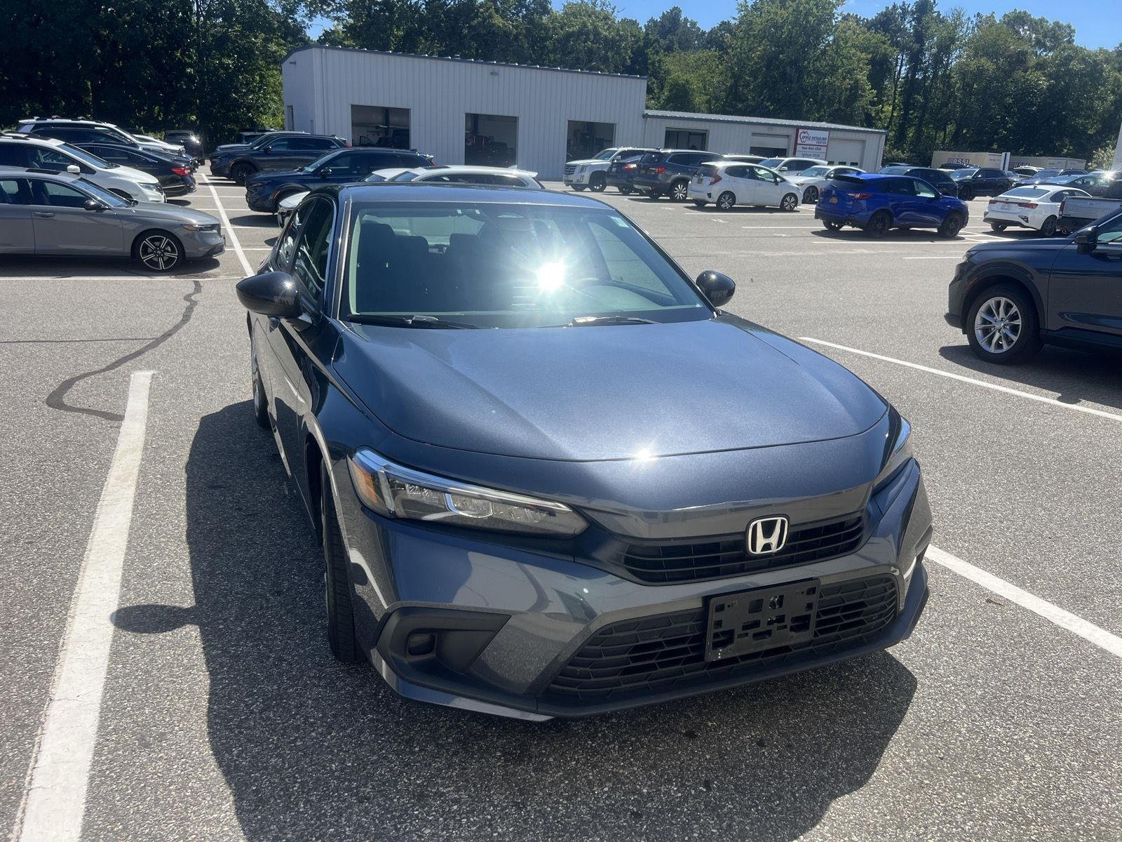 Used 2023 Meteorite Gray Metallic Honda LX image 1