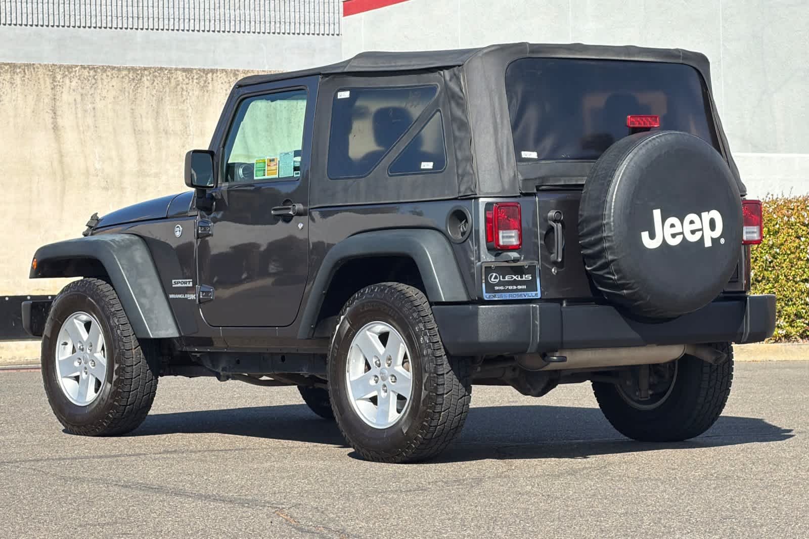 Used 2018 Granite Crystal Metallic Clearcoat Jeep Sport S image 7