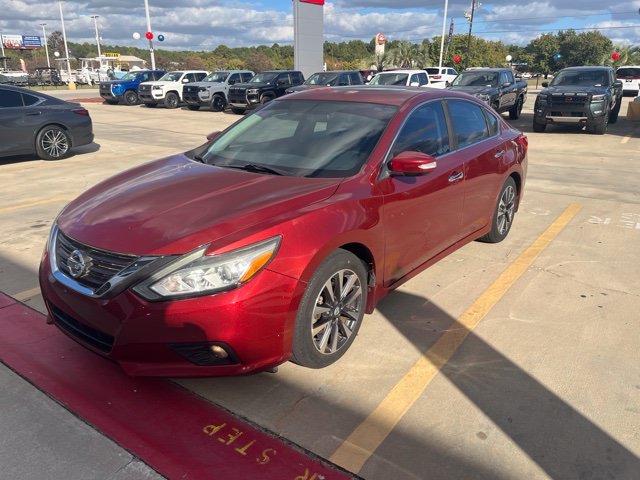 Used 2016 Red Nissan 2.5 SV image 1