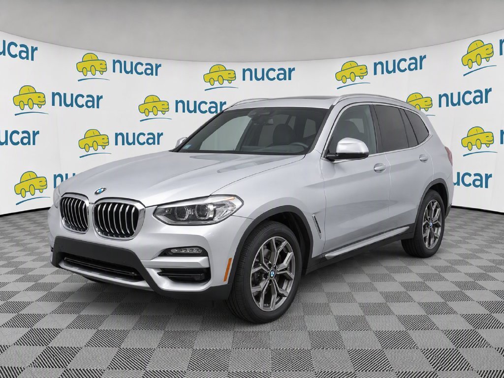 Used 2021 Silver BMW xDrive30i image 1