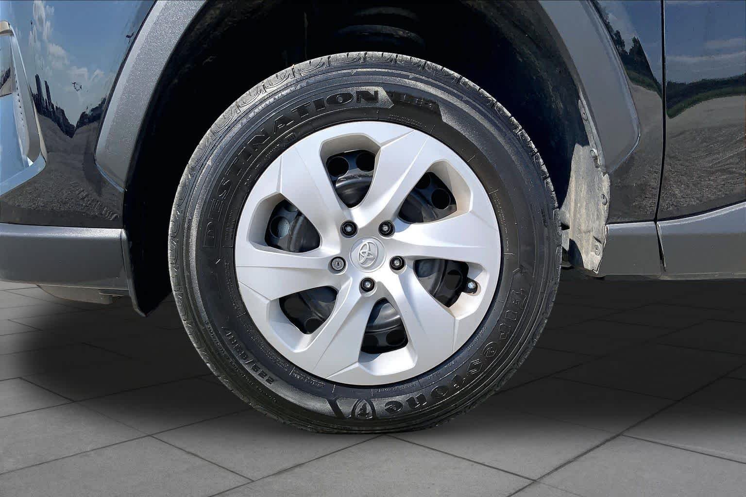 Used 2025 Midnight Black Metallic Toyota LE image 11