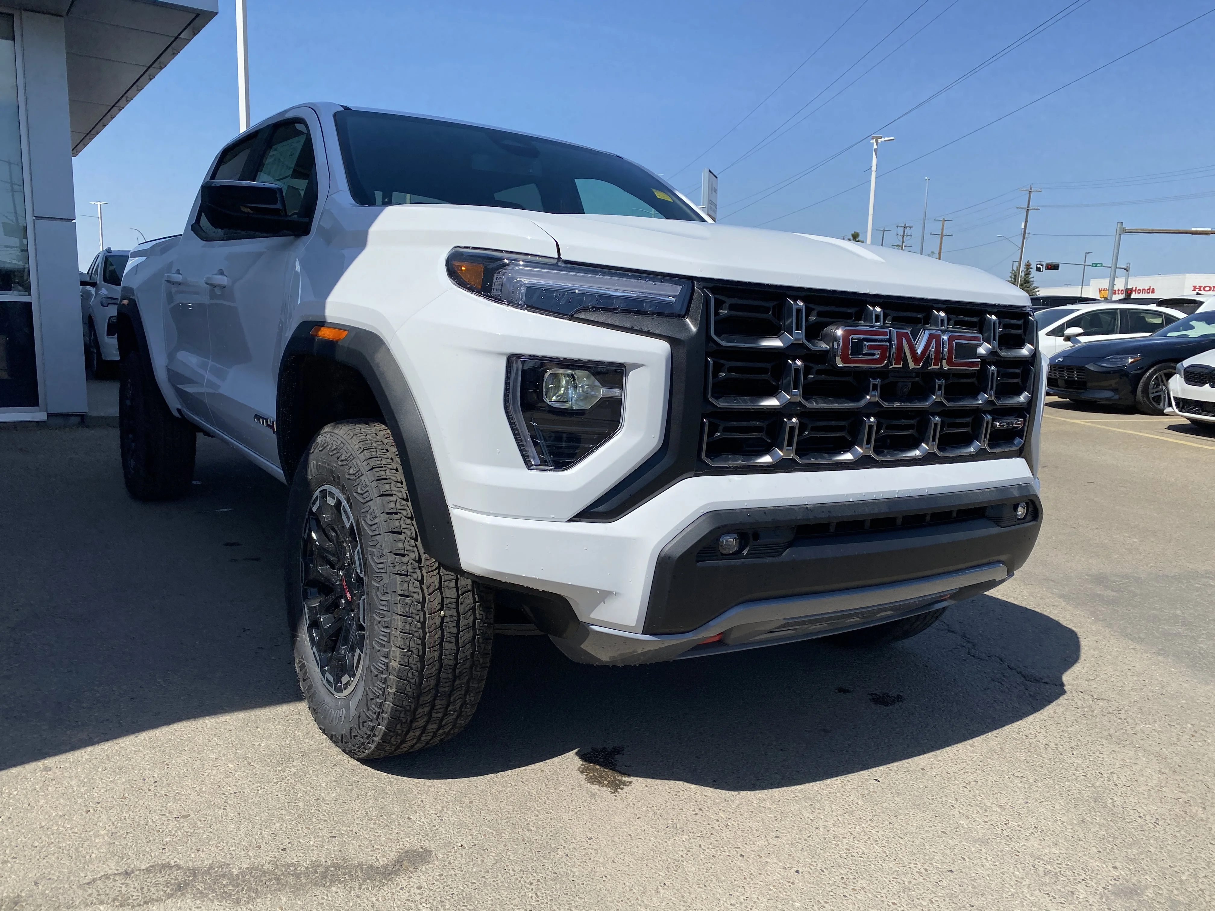New 2026 Summit White GMC 4WD AT4 image 7