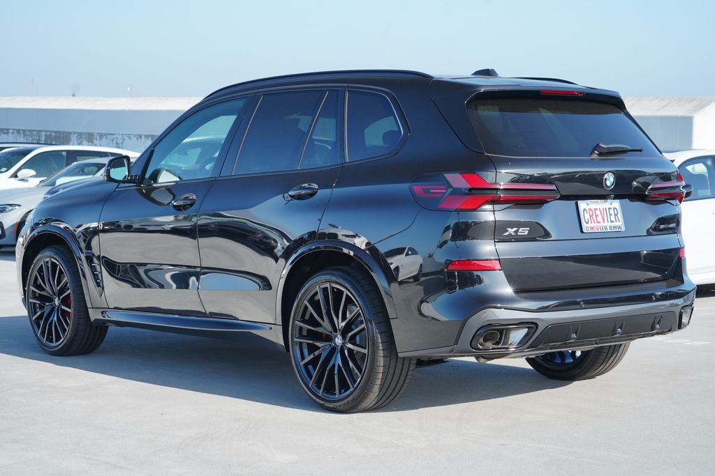 New 2026 Black Sapphire Metallic BMW sDrive40i image 7