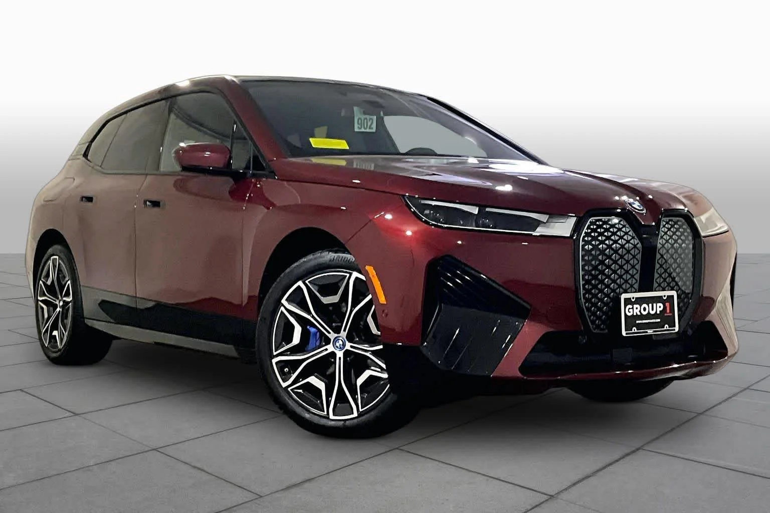 Used 2024 Aventurin Red Metallic BMW xDrive50 image 2