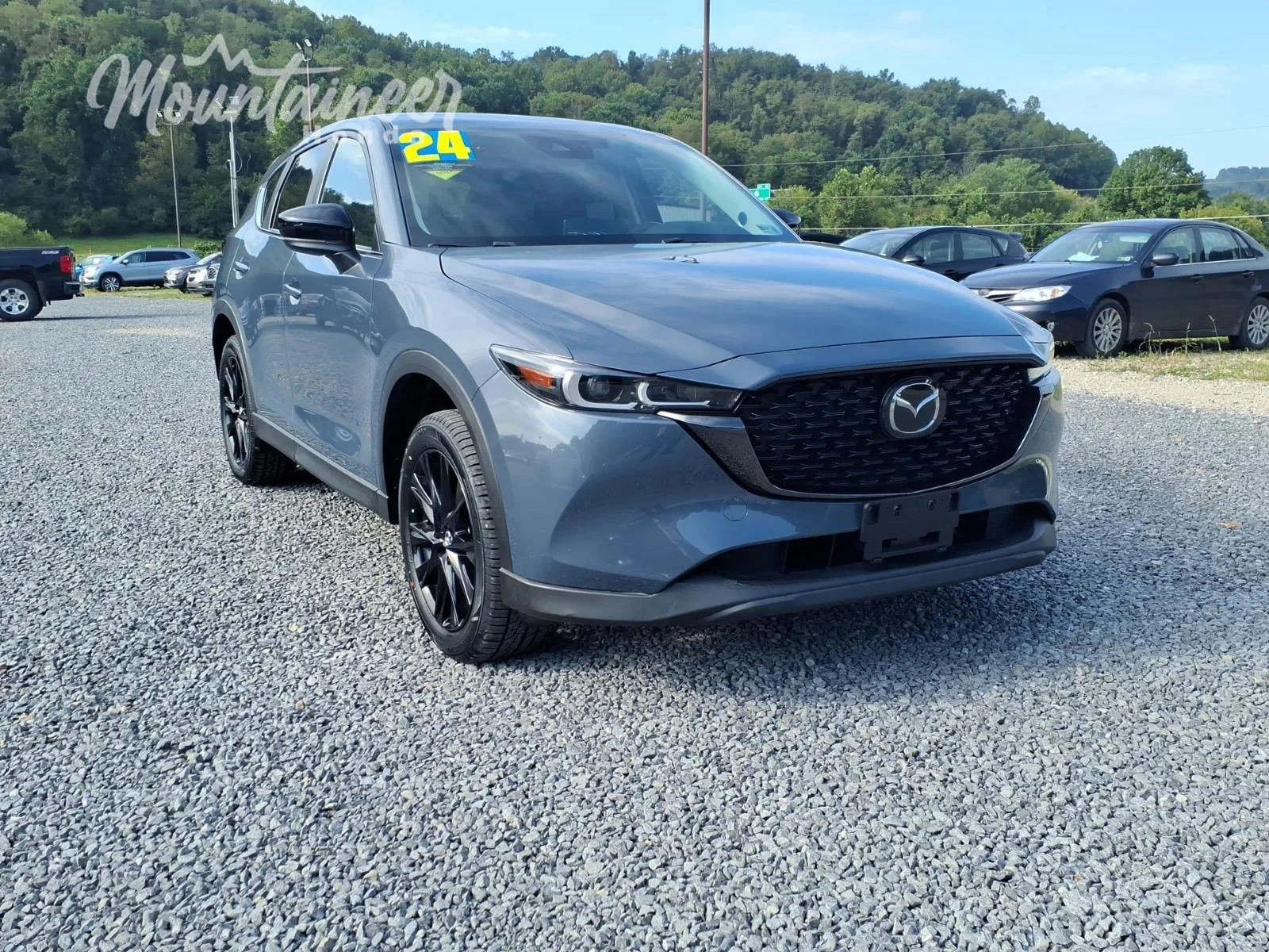 Used 2024 Polymetal Gray Metallic Mazda 2.5 S Carbon Edition image 1