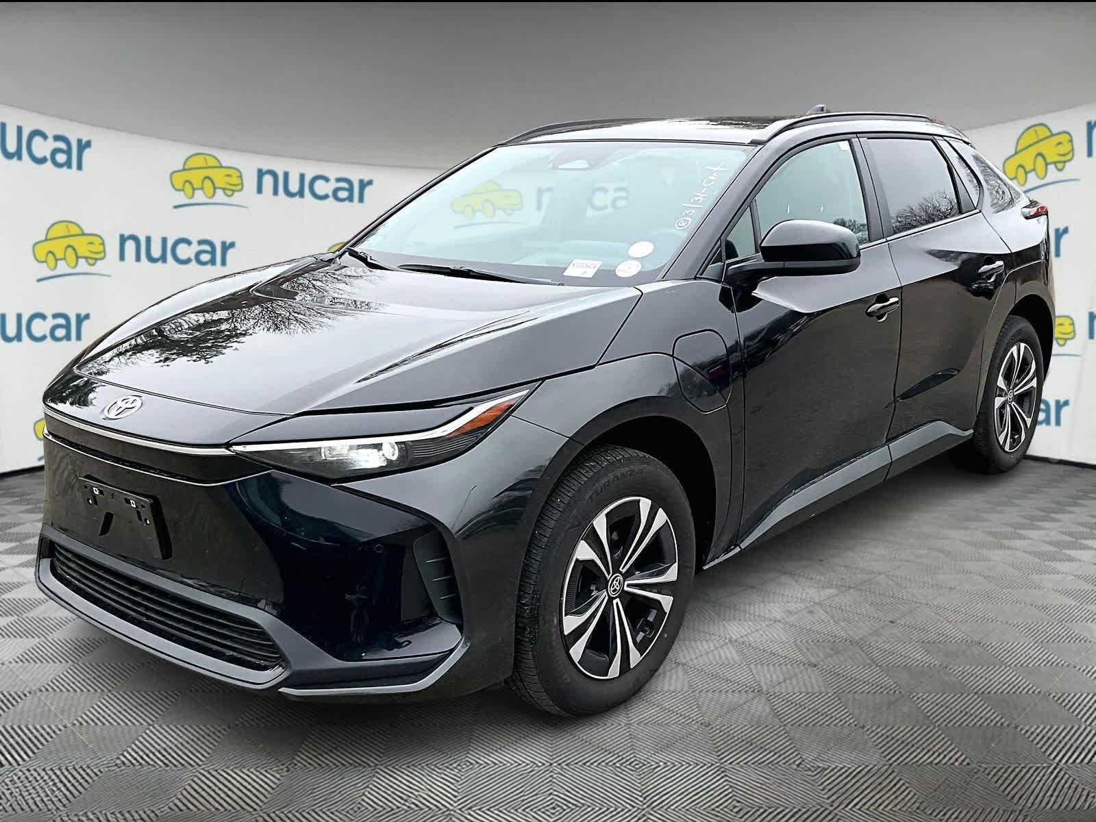 Used 2025 Toyota bZ4X XLE with VIN JTMAAAAA0SA068858 for sale in Norwood, MA