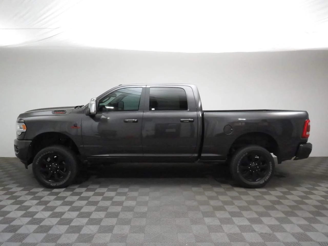 Used 2024 Granite Crystal Metallic Clear Coat Ram Laramie Crew Cab image 2