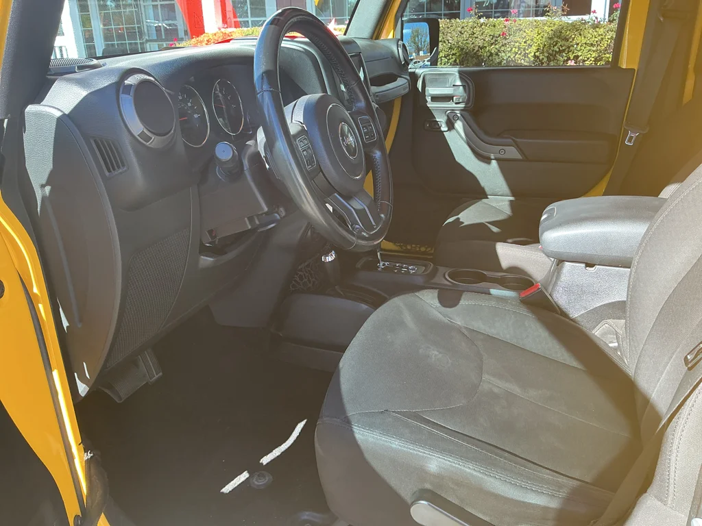 Used 2015 Baja Yellow Jeep Sport image 12