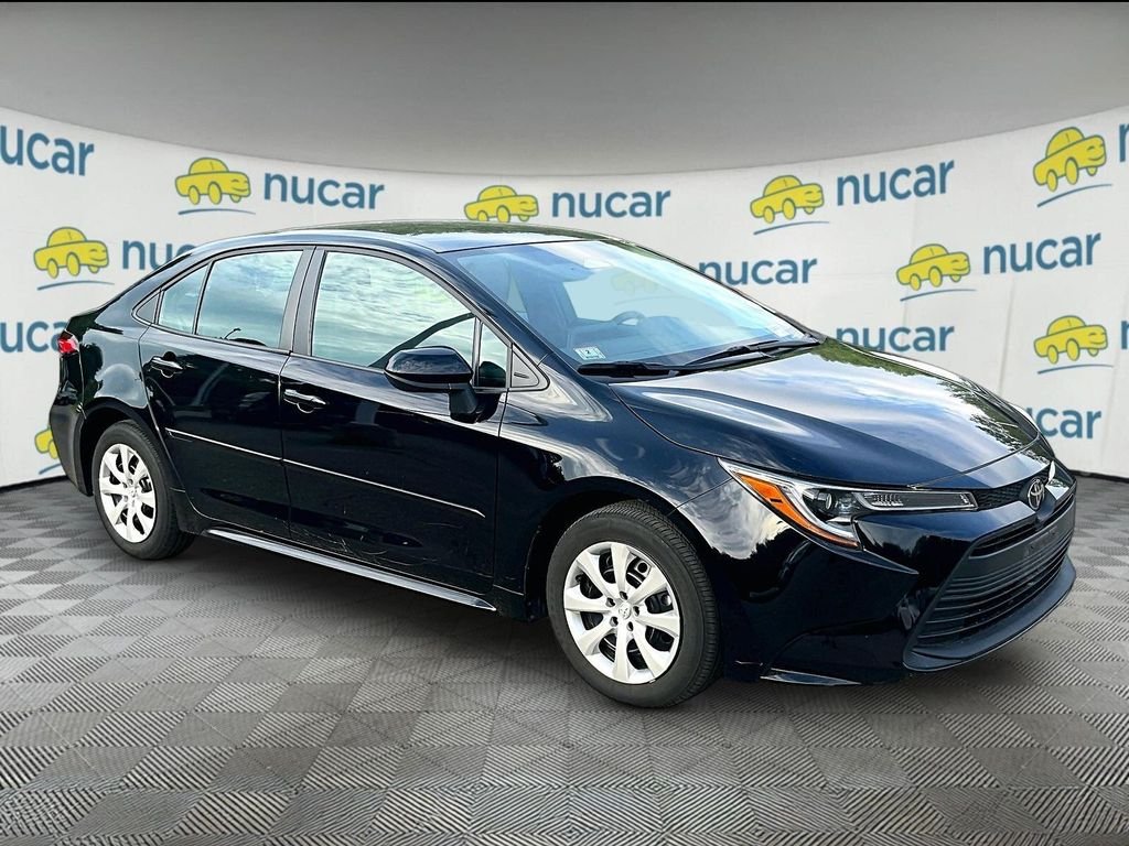 Used 2024 Black Toyota LE image 1