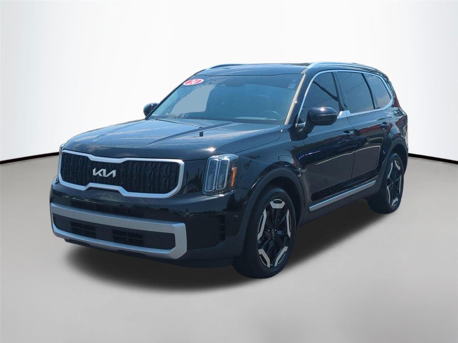 Used 2024 Ebony Black Kia EX image 2