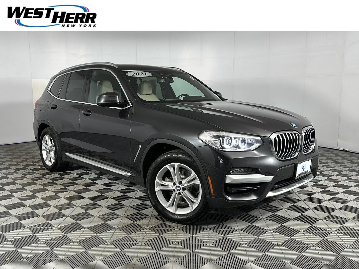 Used 2021 Dark Graphite Metallic BMW xDrive30i image 1