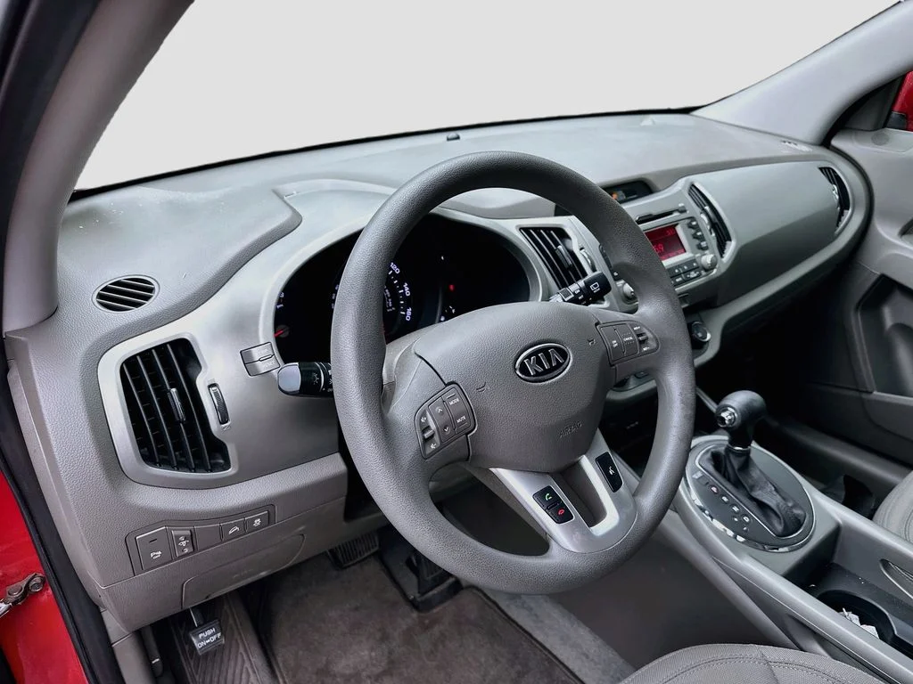 Used 2012 Signal Red Kia LX image 9