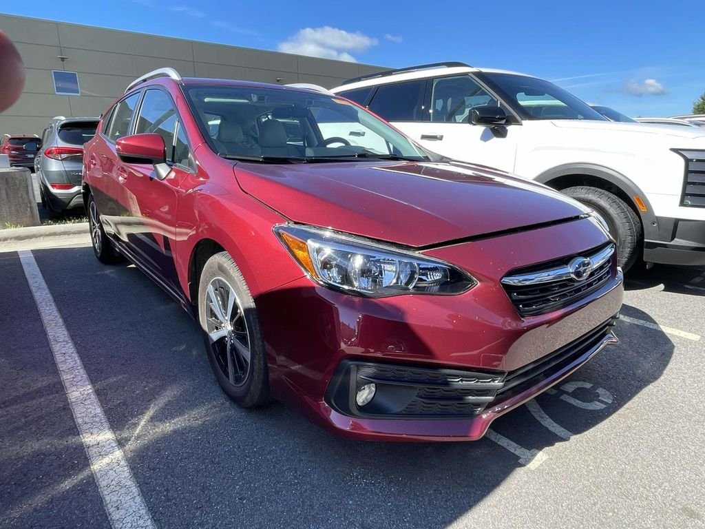 Used 2023 Crimson Red Pearl Subaru Premium image 1