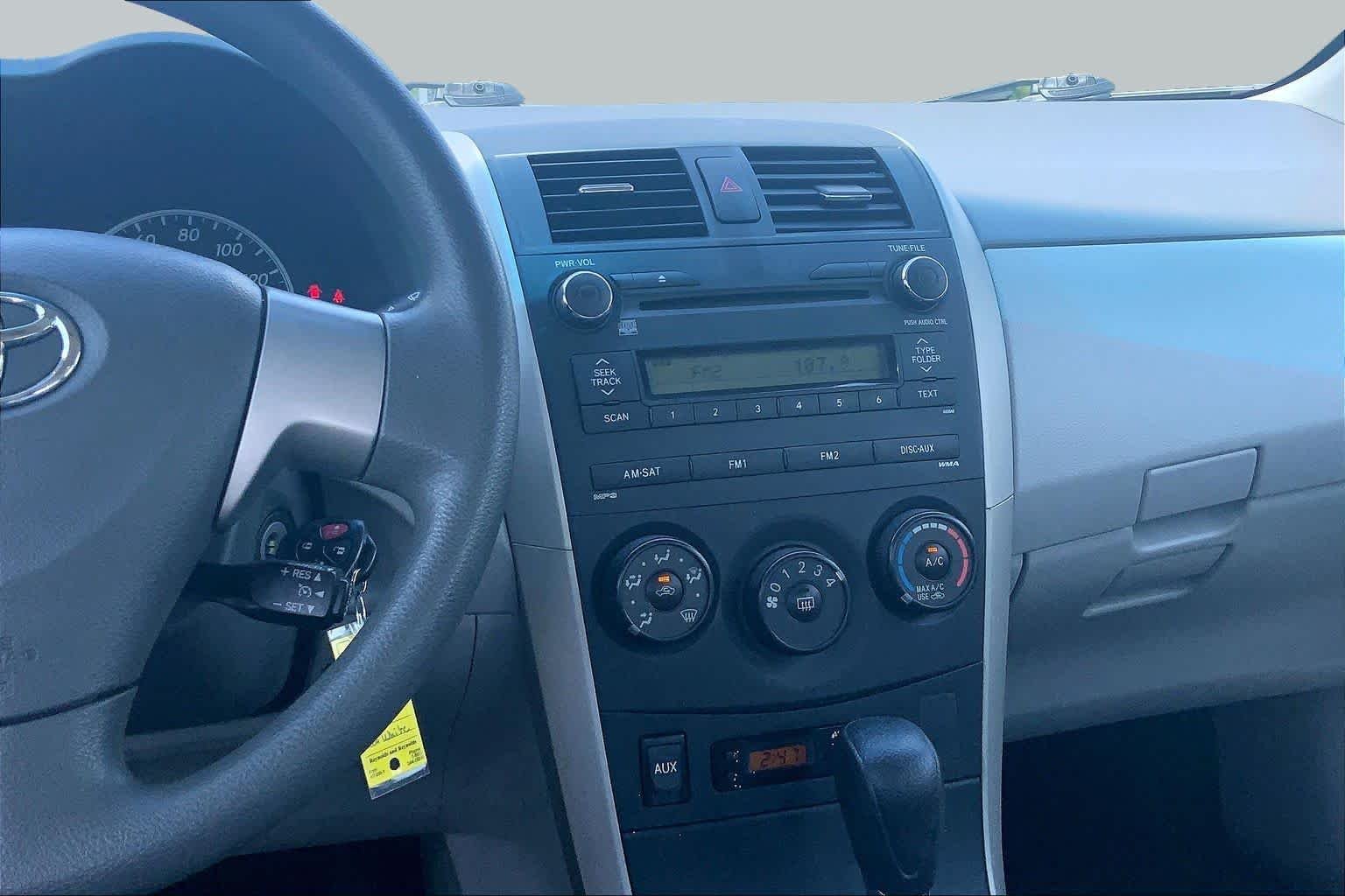 Used 2010 Super White Toyota LE image 6