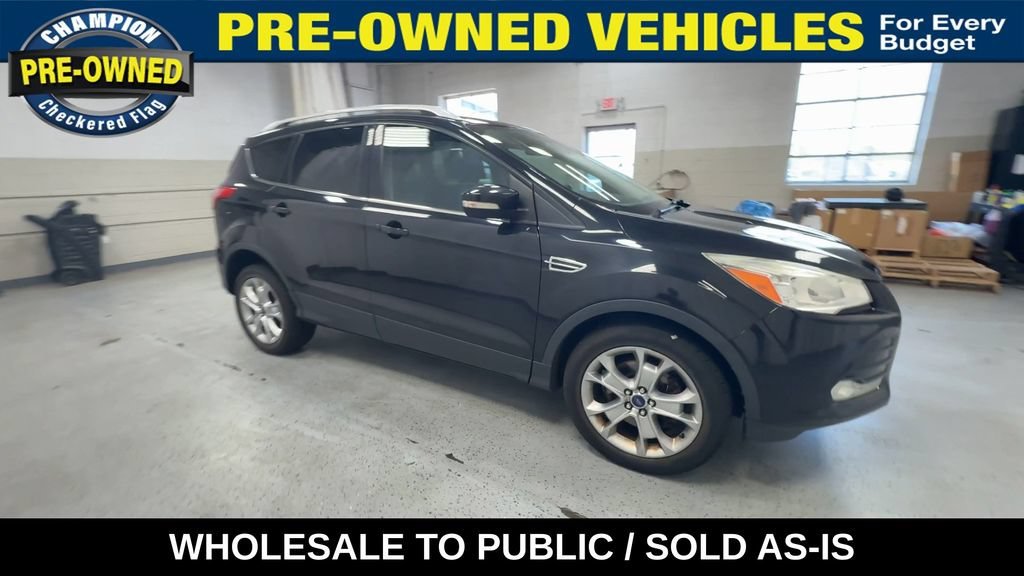 Used 2015 Ford Escape Titanium with VIN 1FMCU9J97FUB47559 for sale in Royal Oak, MI