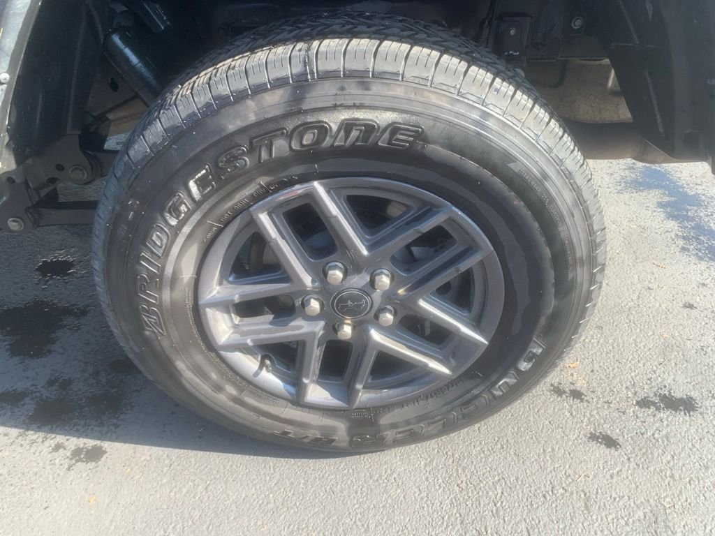 Used 2024 Granite Crystal Metallic Clearcoat Jeep Sport S image 7