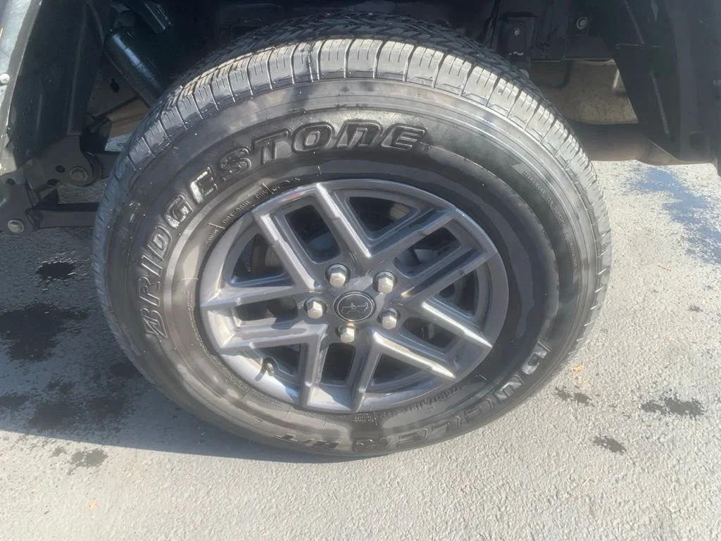 Used 2024 Granite Crystal Metallic Clearcoat Jeep Sport S image 7