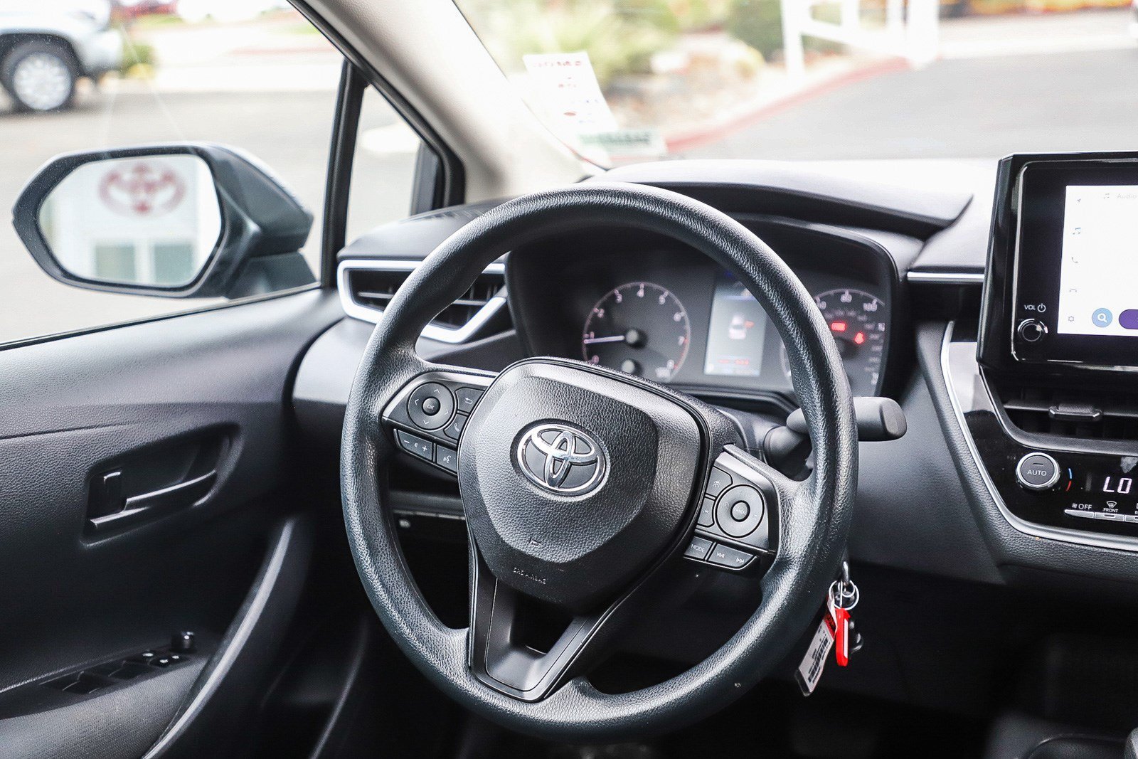 Used 2024 Underground/Midnight Black Metallic Toyota LE image 14