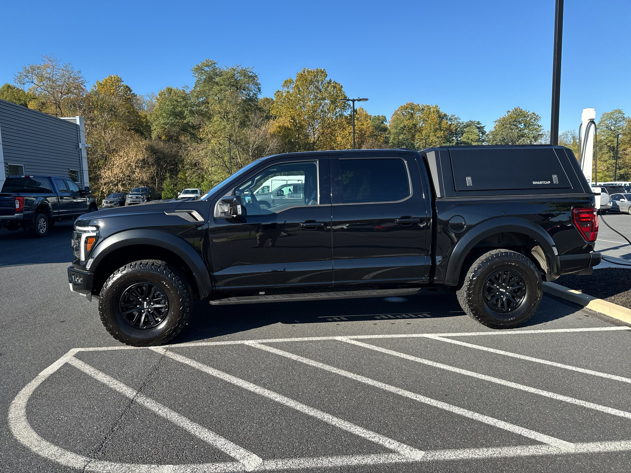Used 2025 Agate Black Metallic Ford Raptor image 10