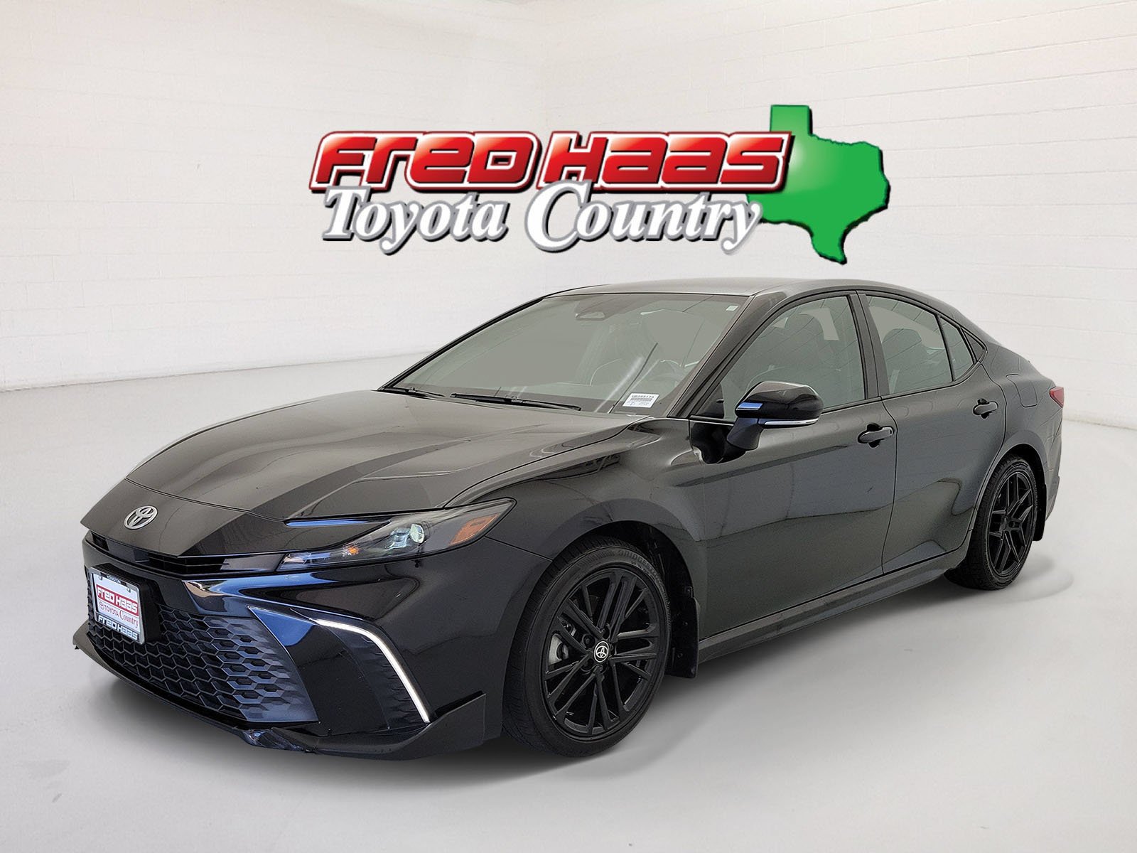 Used 2025 Midnight Black Metallic Toyota SE image 1