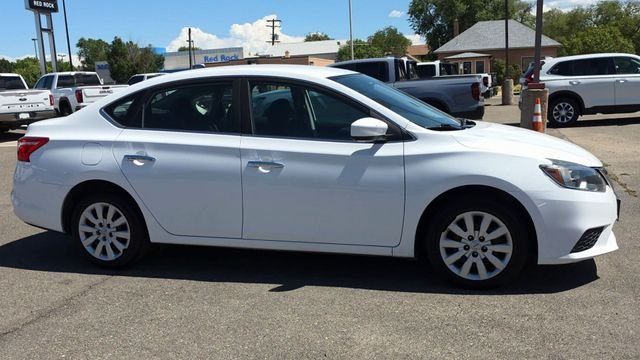 Used 2019 White Nissan S image 11