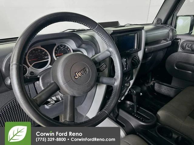 Used 2010 Black Clearcoat Jeep Unlimited Sport image 9