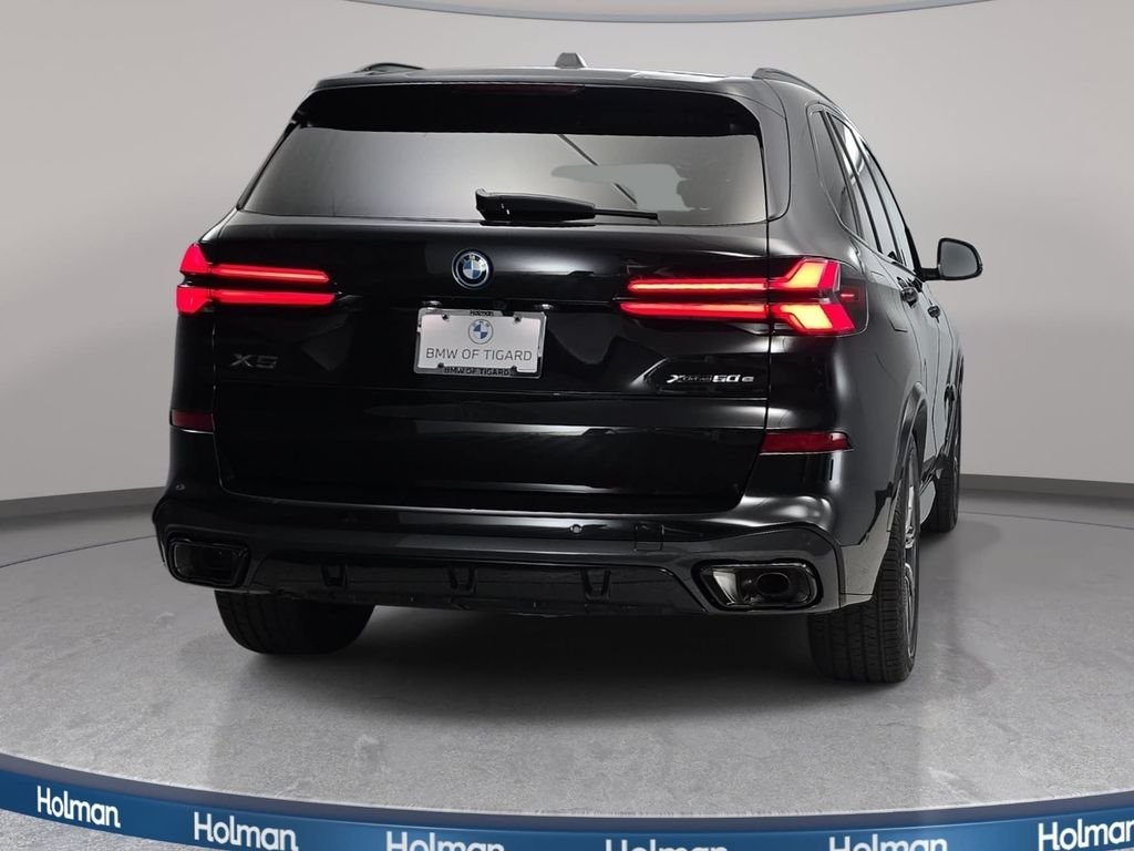 New 2026 Black Sapphire Metallic BMW xDrive50e image 6