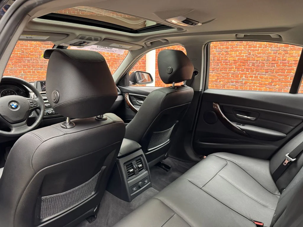 Used 2015 Black BMW 320i xDrive image 26