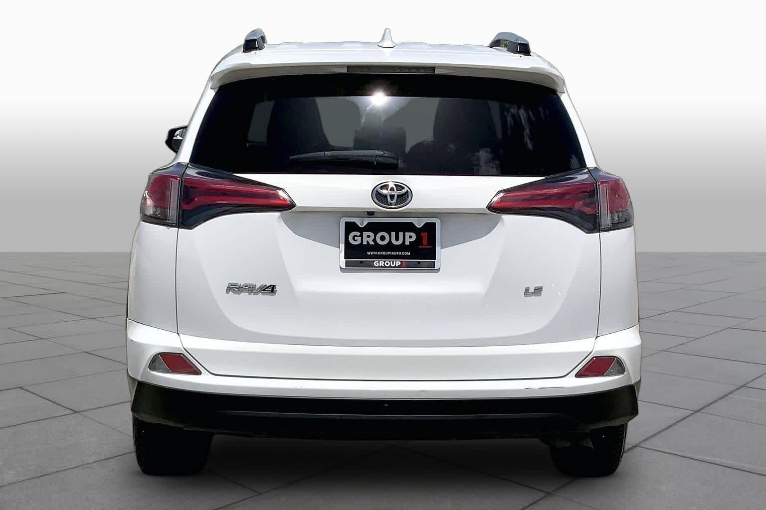 Used 2016 Super White Toyota LE image 5