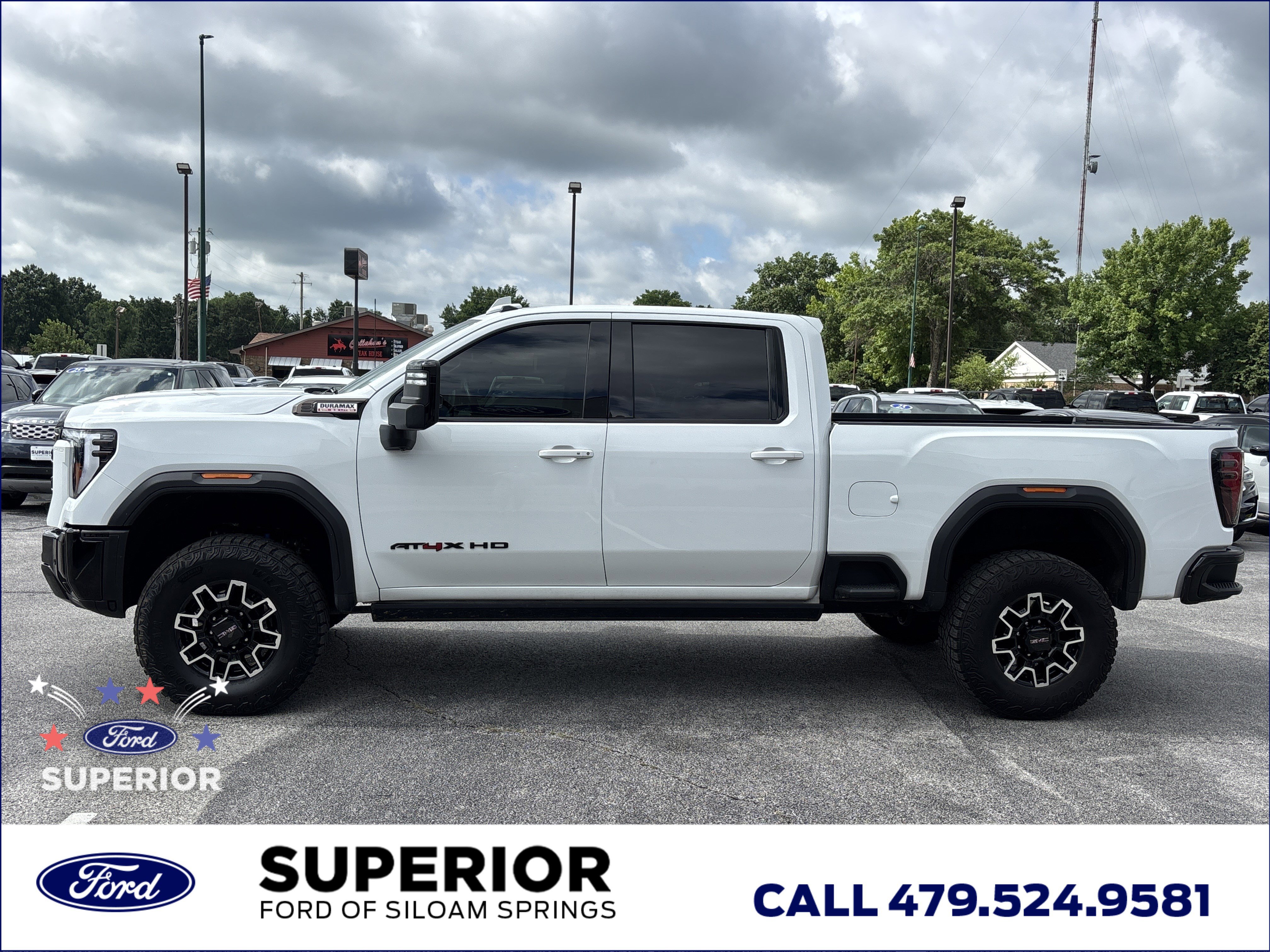 Used 2024 Summit White GMC AT4X Crew Cab 4WD image 11