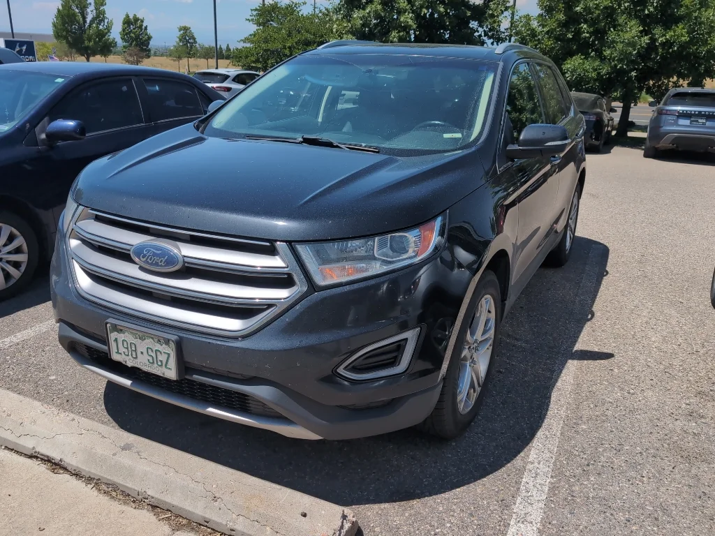 Used 2016 Shadow Black Ford Titanium image 1