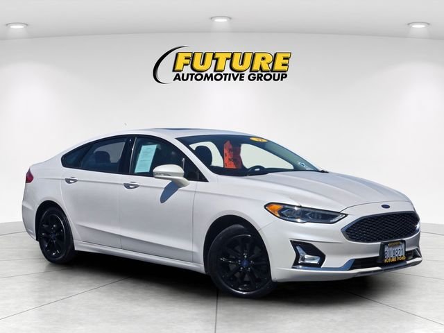 Used 2019 White Ford Titanium image 1