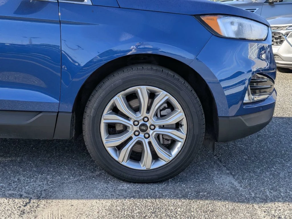 Certified Used 2024 Blue Metallic Ford Titanium image 11