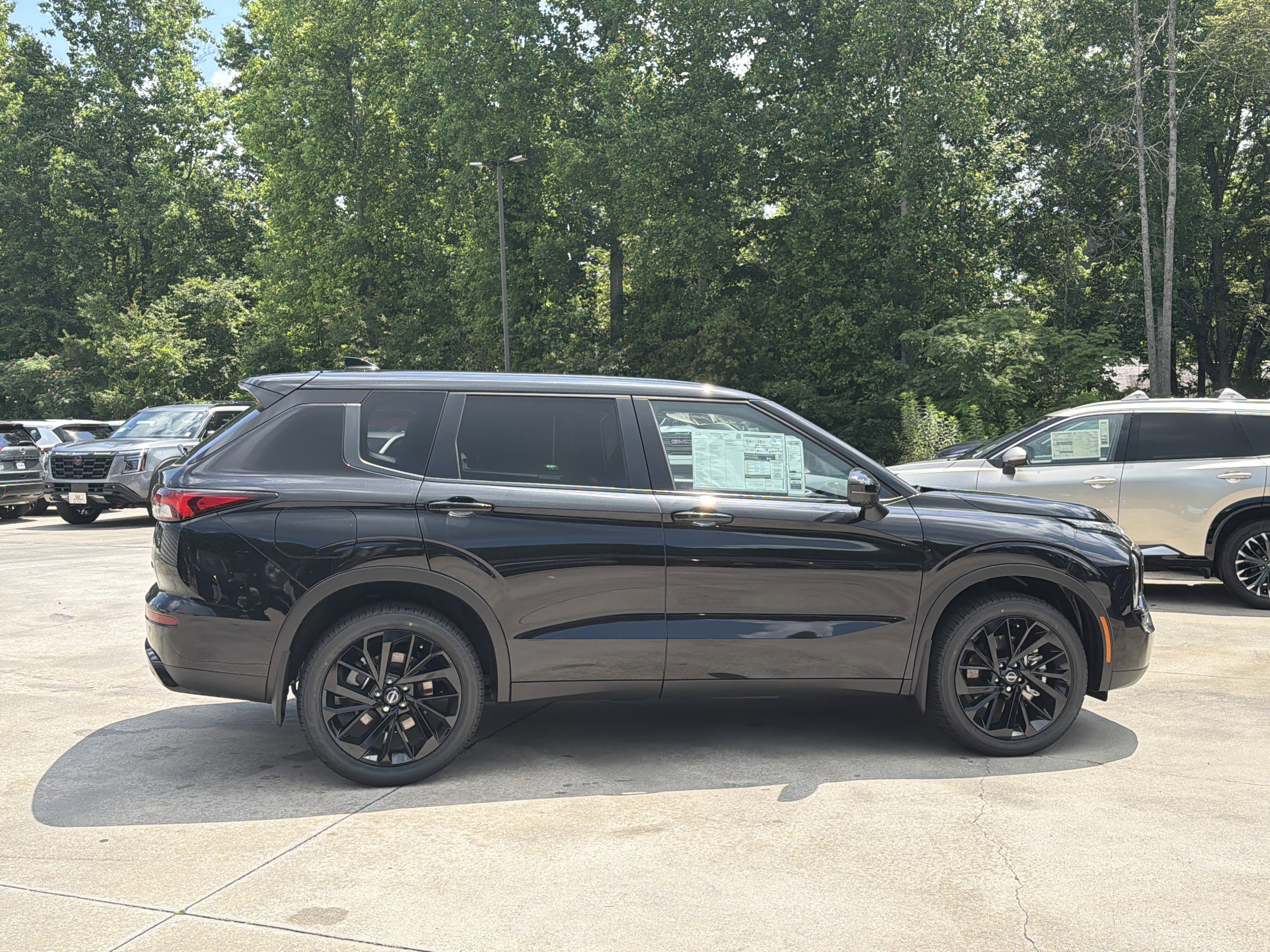 New 2026 Cosmic Black Nissan SL image 9