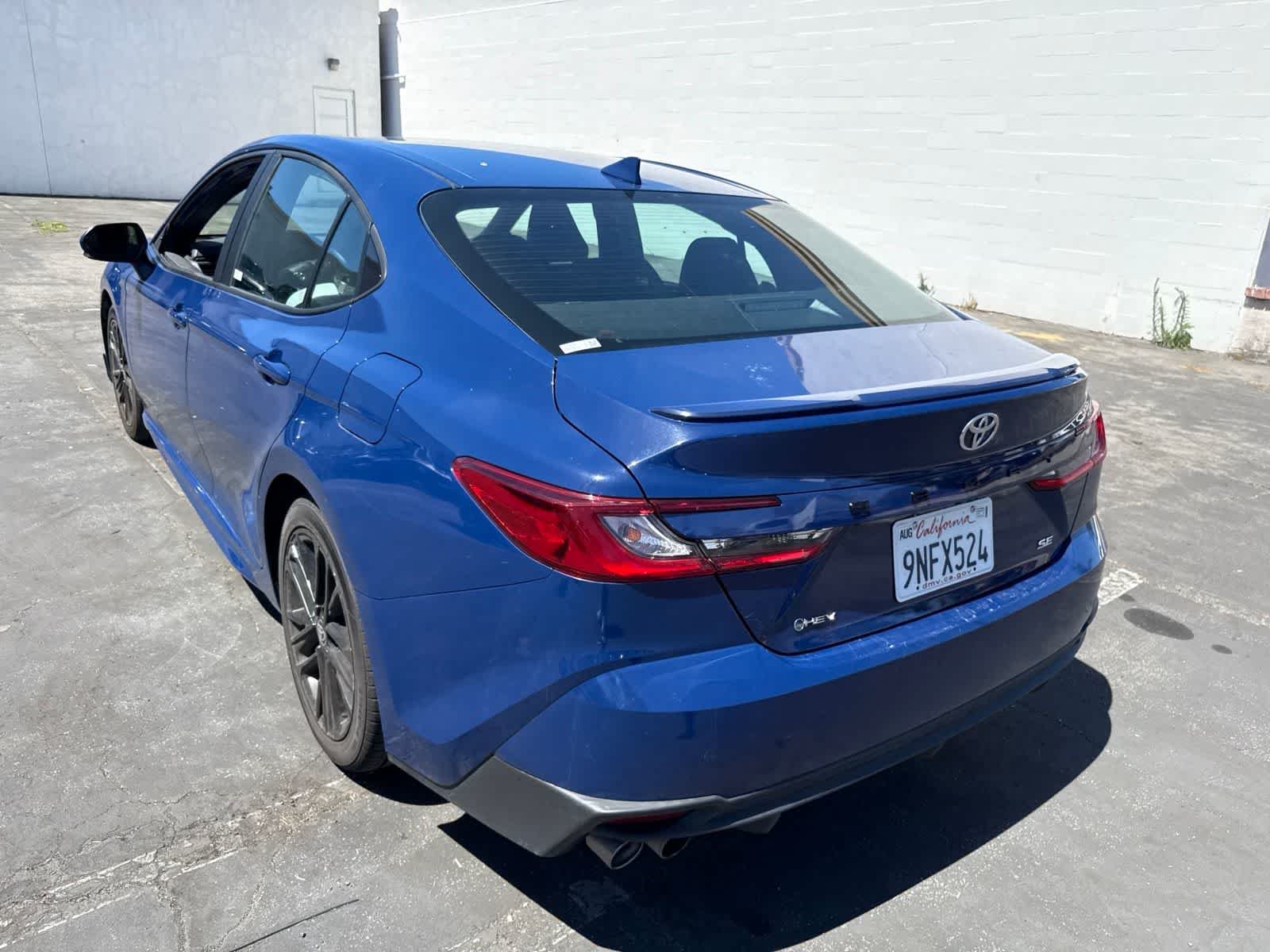 Used 2025 Reservoir Blue Toyota SE image 19