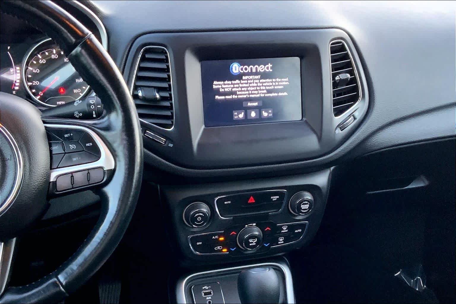 Used 2021 Granite Crystal Metallic Clearcoat Jeep Sport image 7