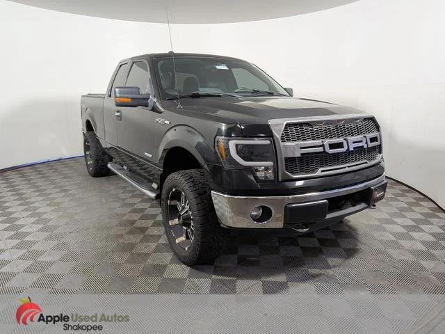 Used 2011 Black Ford XLT image 1