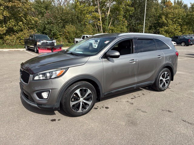 Used 2016 Kia Sorento EX with VIN 5XYPH4A10GG037012 for sale in Kansas City