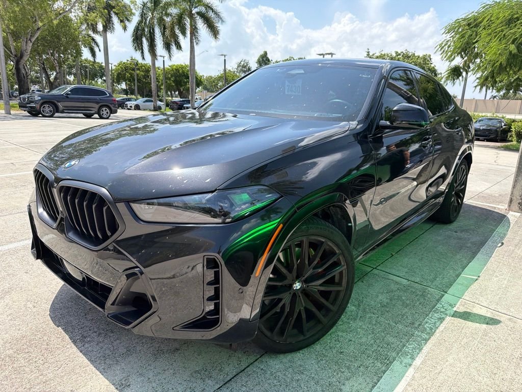 Certified Used 2026 Black Sapphire Metallic BMW xDrive40i image 1